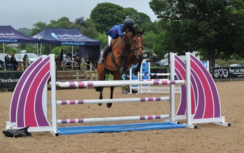 Julia Helm takes first place in the NAF Five Star Bronze League Semi Final at Northcote Stud Julia Helm takes first place in the NAF Five Star Bronze League Semi Final at Northcote Stud